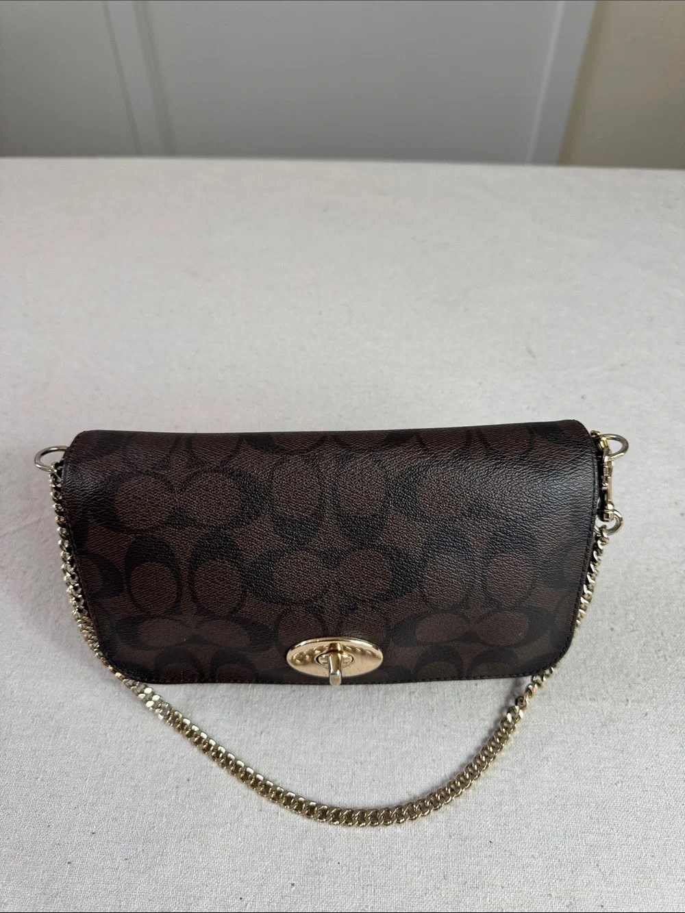 Coach Brown Signature Ruby Mini Crossbody with Gold Hardware bag.